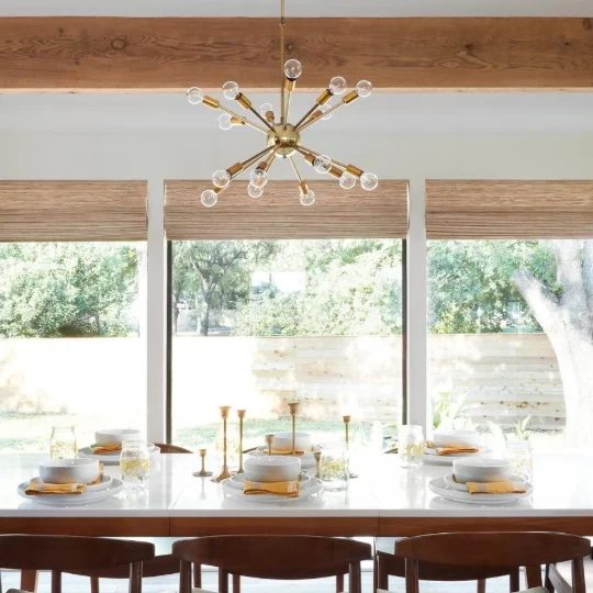 Mid Century Modern Dining Room With Wooden Table And Open Windows