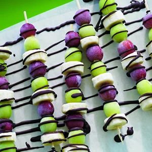 frozen grape and banana skewers with chocolate drizzle - Culinary