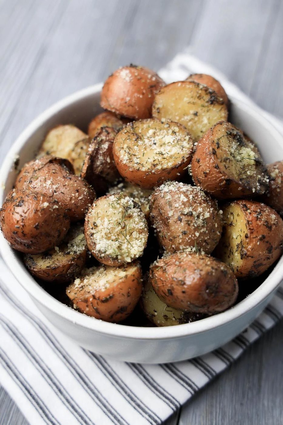Herb Roasted Potatoes in a white bowl