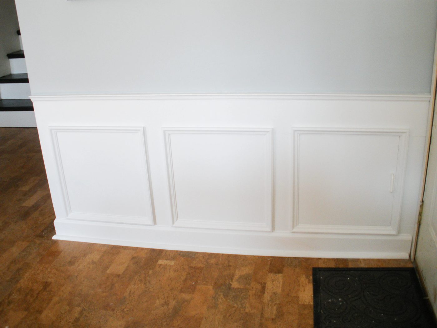 Hiding plumbing access with wainscoting-7