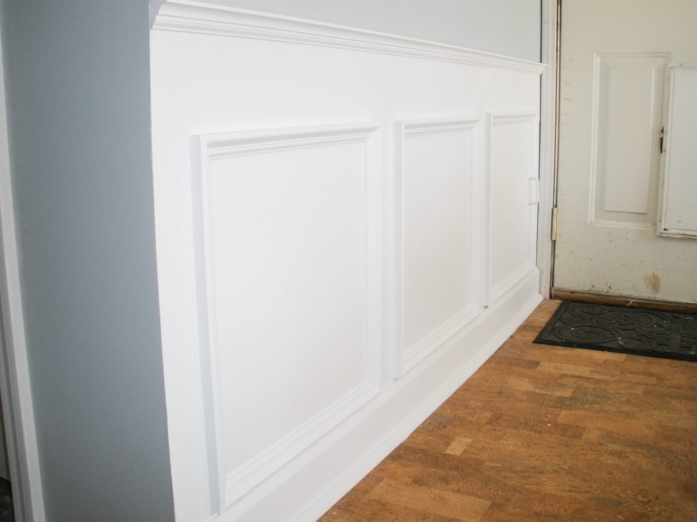Hiding Plumbing Access With Wainscoting