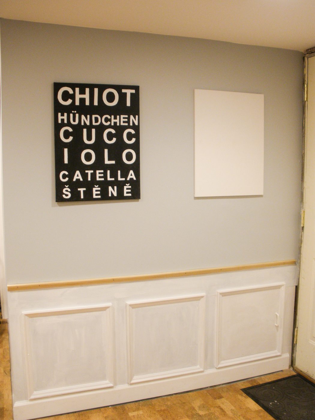 Hiding plumbing access with wainscoting-4
