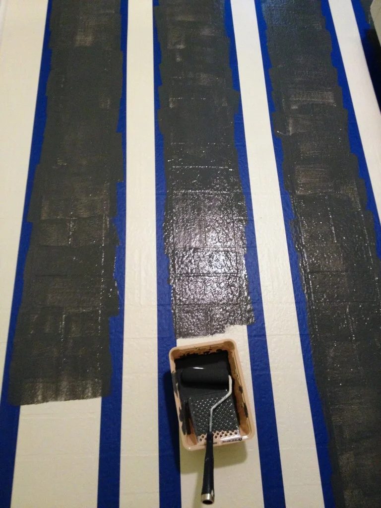low cost laundry room makeover with striped painted floor, featured on Bekob