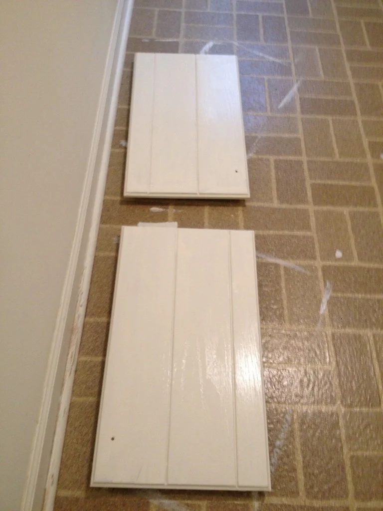 painting laundry room cabinet doors, featured on Bekob