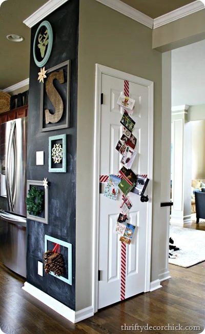 holiday gallery wall and card display on door - Thrifty Decor Chick via @Bekob