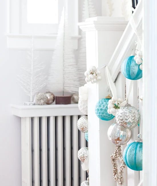 tiffany blue christmas ornament baubles on stairs - Style at Home via @Bekob