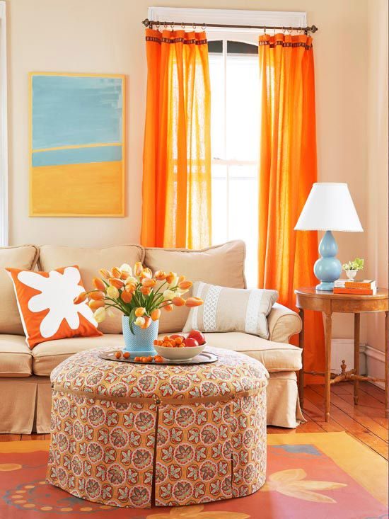 orange curtains and modern blue accents