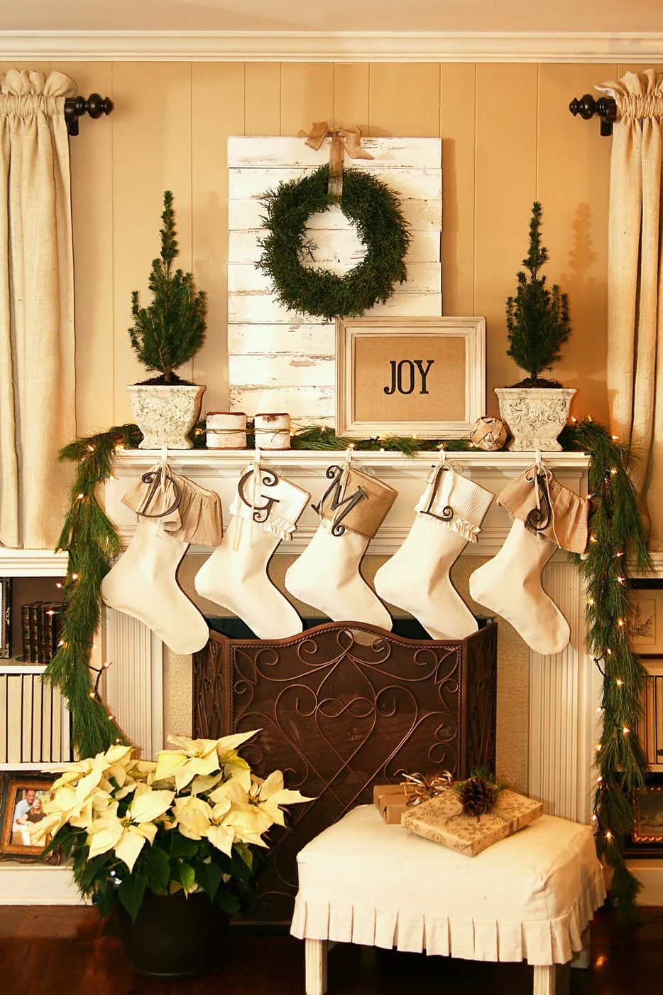 Holiday (or Christmas) mantel options, Fresh Greens and Burlap mantel by The Butlers
