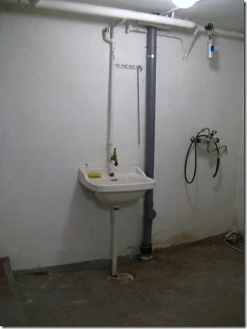 Chez Larson basement laundry before