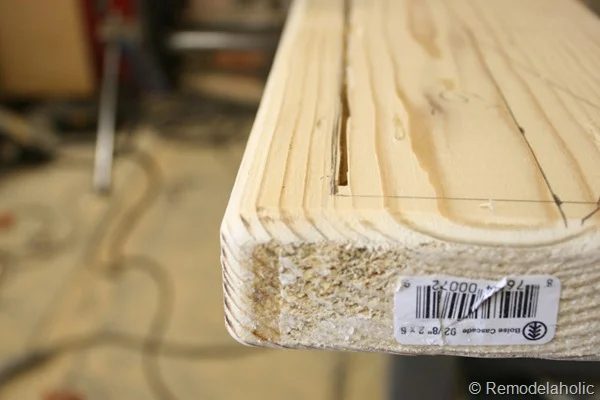 building out stair with wood bullnose and house numbers under barn door (5)