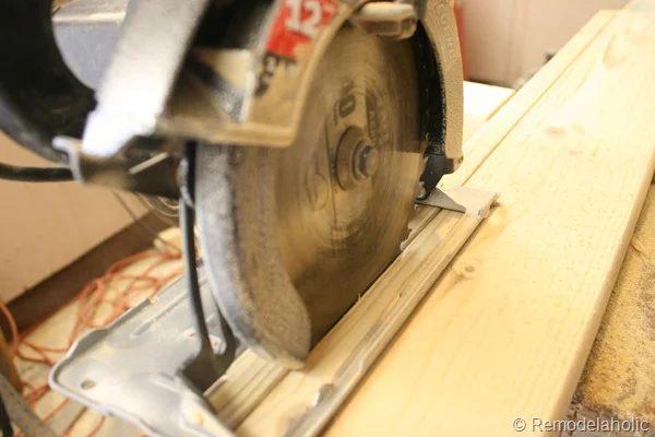 building out stair with wood bullnose and house numbers under barn door (4)