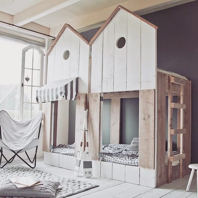 house loft bed play area with side-by-side city facade via bestkiddos