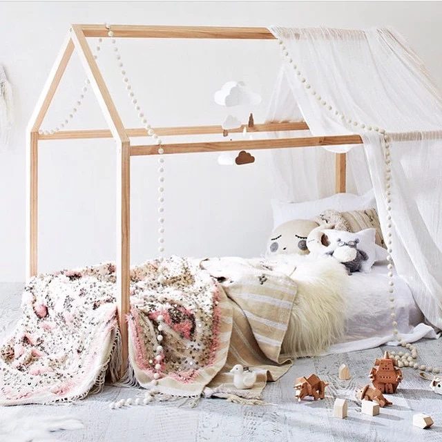 toddler floor bed with house frame and cloud mobile via piplastudio