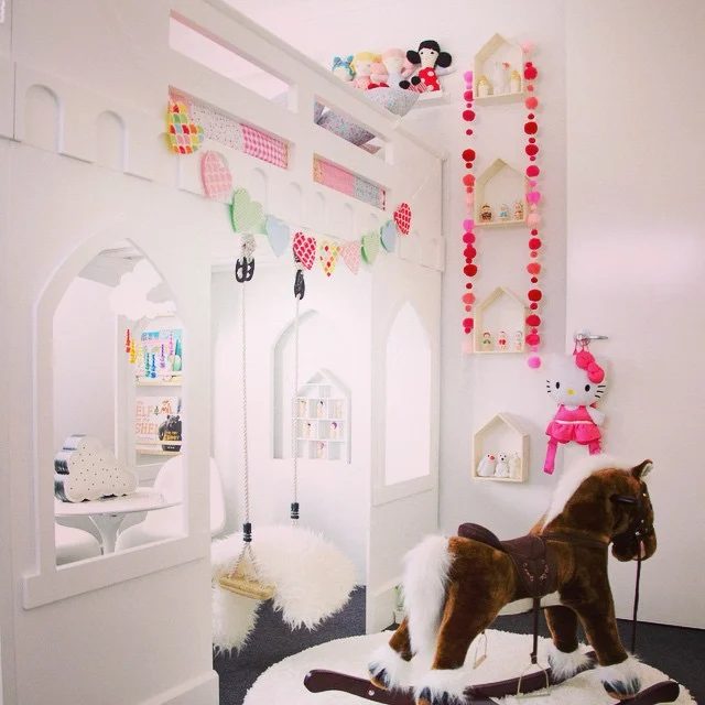 girls castle loft bed and play area via macarenanguyen
