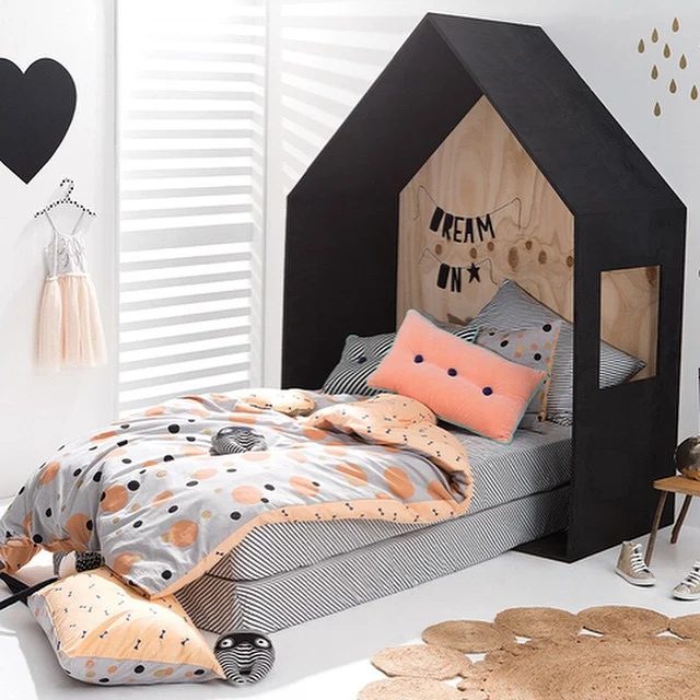 black house headboard with window, great for a toddler floor bed via ministyle
