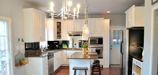 How New Lighting and Paint Brightened Up A Dark Kitchen