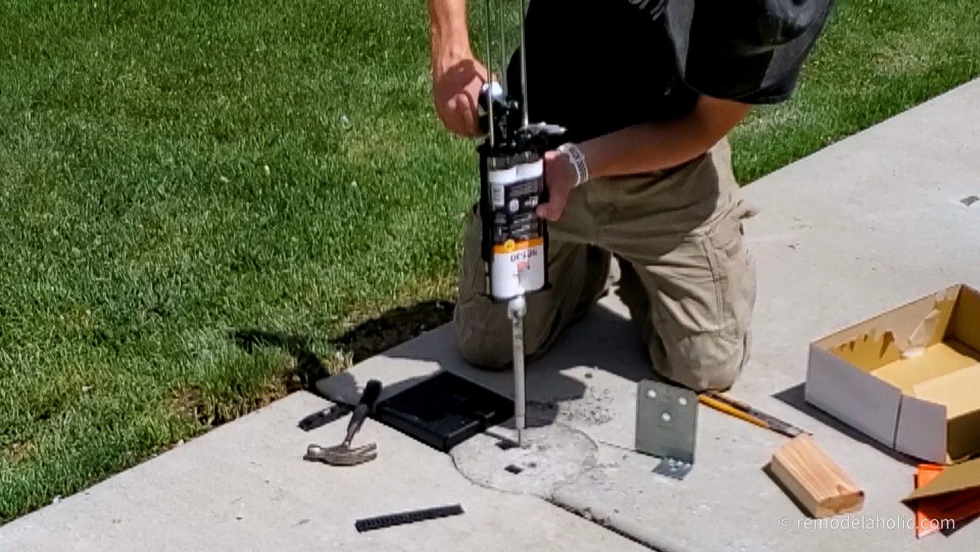 Adding Epoxy to Post Base Bracket Hole Before Bolt