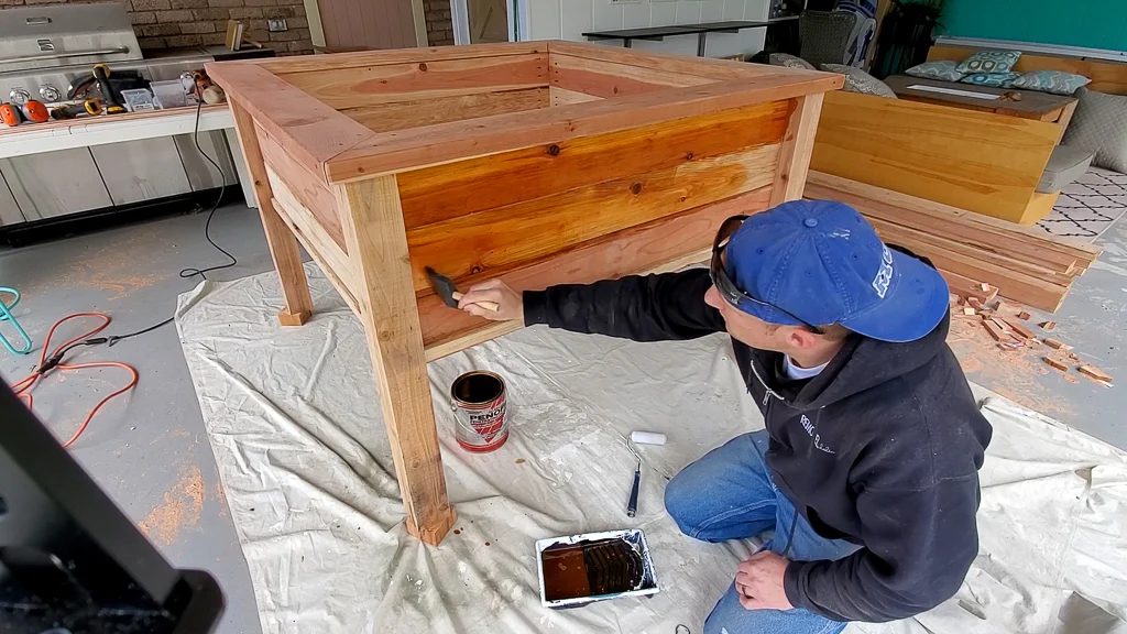 oiling redwood, raised garden bed planter