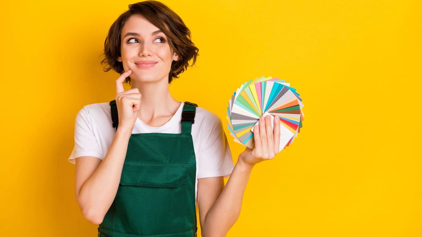 Woman Choosing Paint Colors