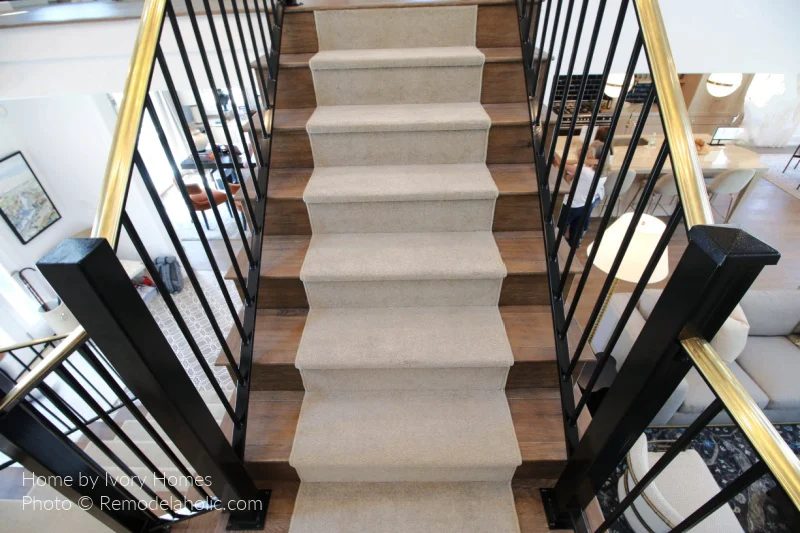 Carpeted Stair Runner Rug On Open Wood Staircase With Black Baluster Railing And Gold Handrail, Bekob SL18 H04