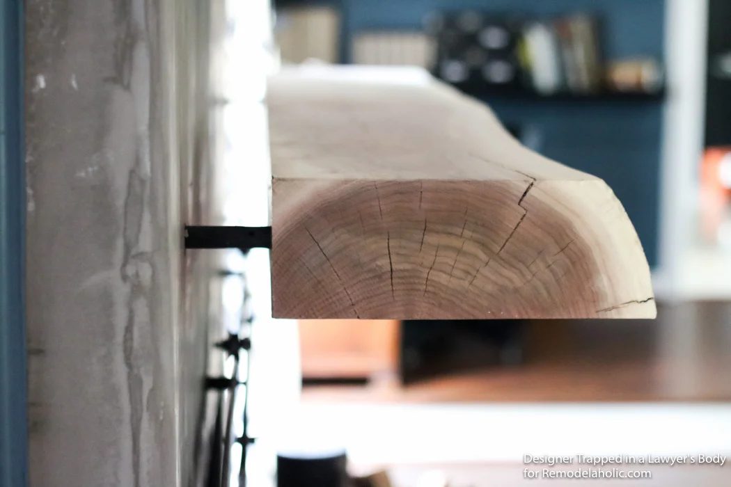 Learn how to install a wood mantel (even if it's clearly heavy) with this straightforward walkthrough from Designer Trapped in a Lawyer's Body for Bekob.com!