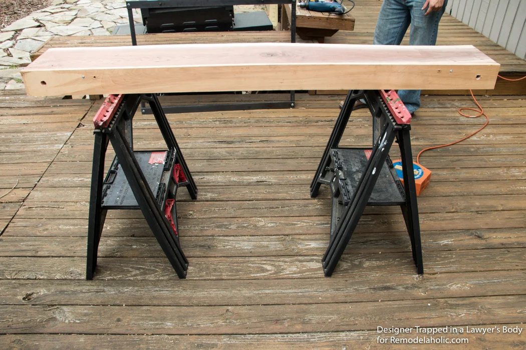 Learn how to install a wood mantel (even if it's clearly heavy) with this straightforward walkthrough from Designer Trapped in a Lawyer's Body for Bekob.com!