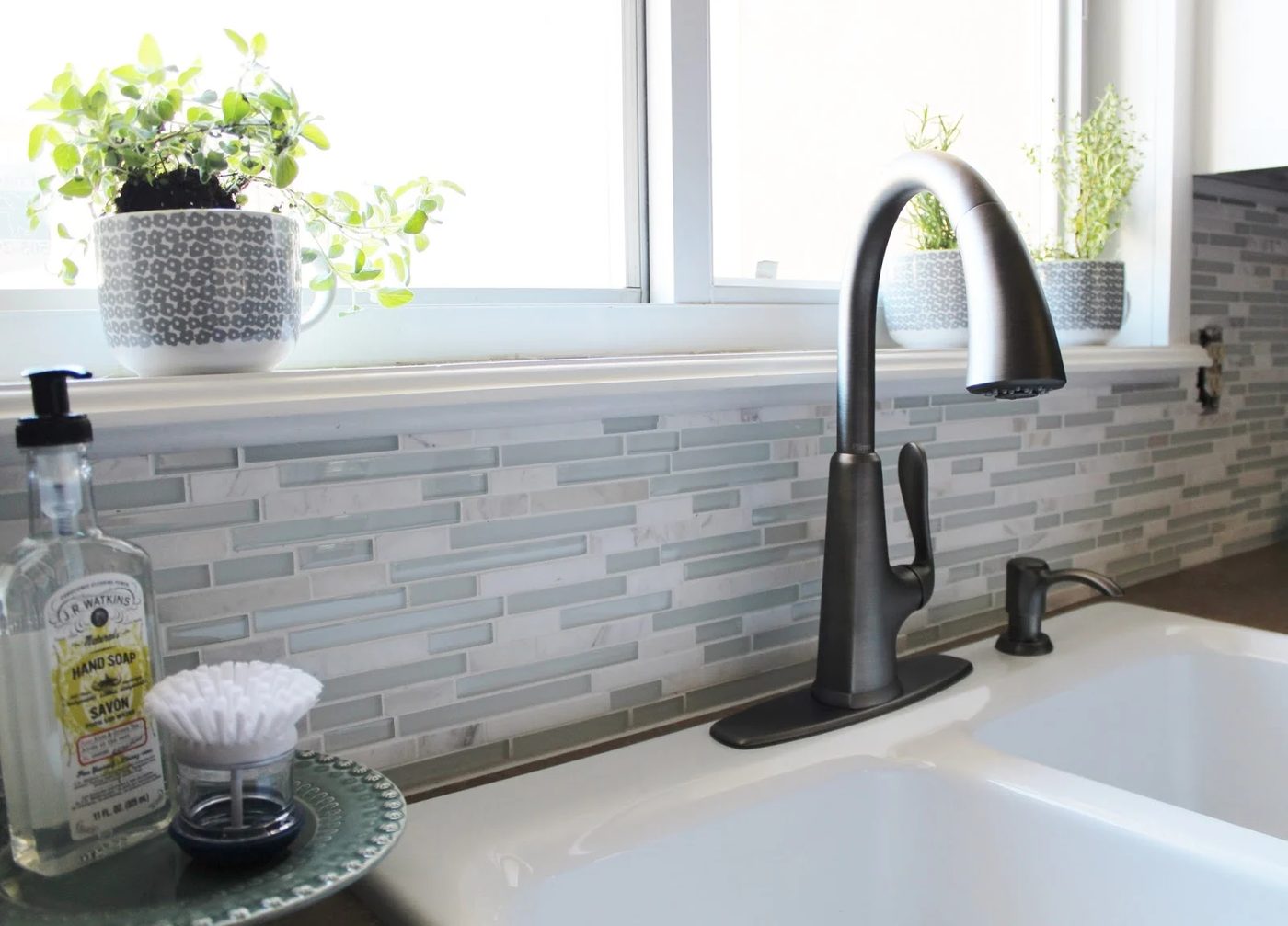 smudge-resistant pasadena faucet in slate for a grey and white kitchen, House For Five featured on Bekob
