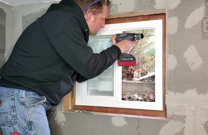Installing window in basement bathroom