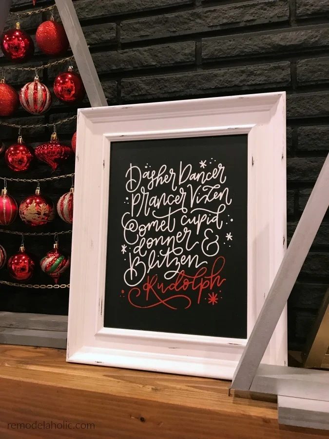 White Frame With Black Background And White Caligraphy Of Reindeer Names