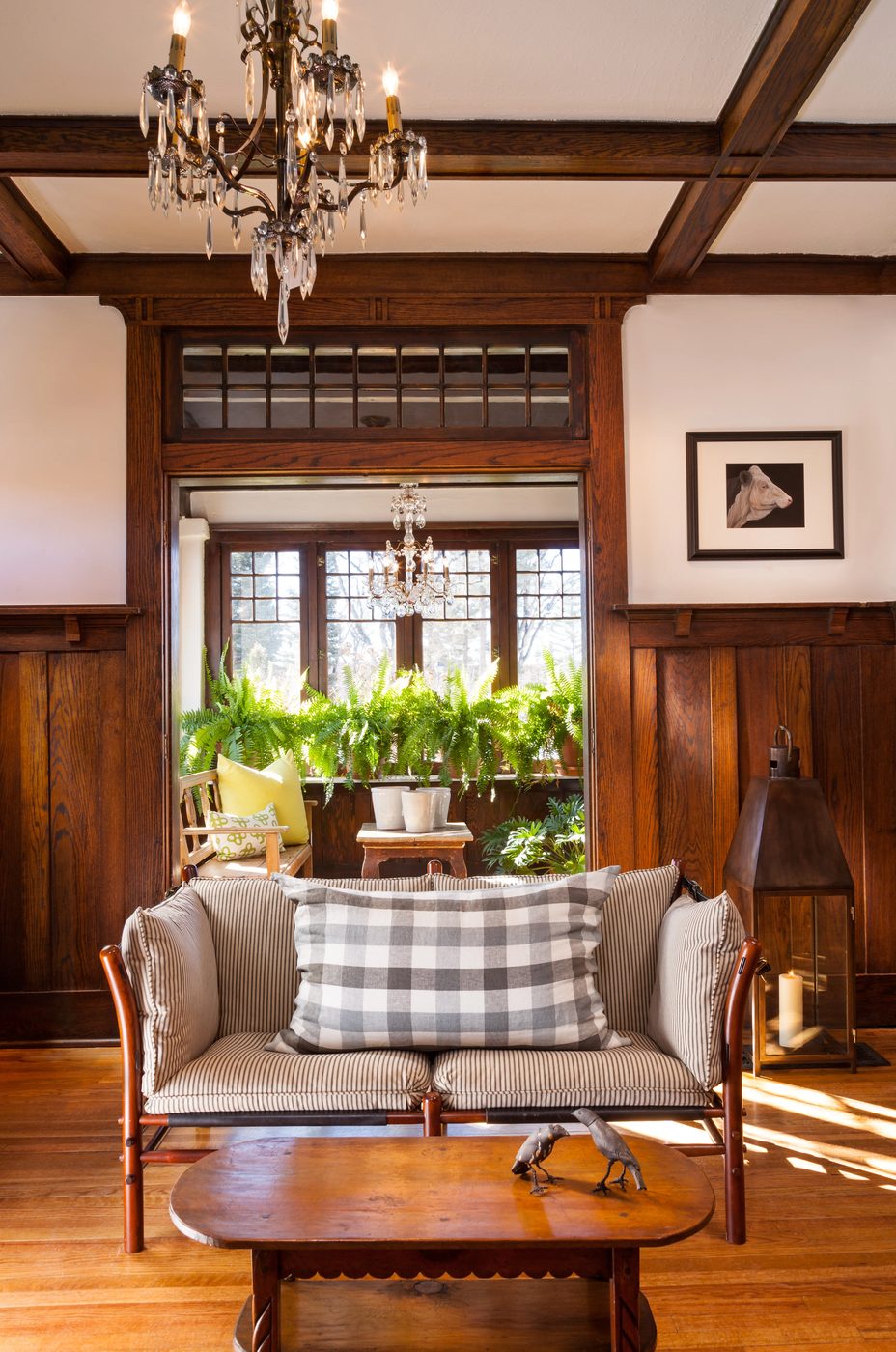 modern living room with wood paneled wainscot and coffered ceiling | by Violante & Rochford Interiors, photo credit © Wendy McEahern