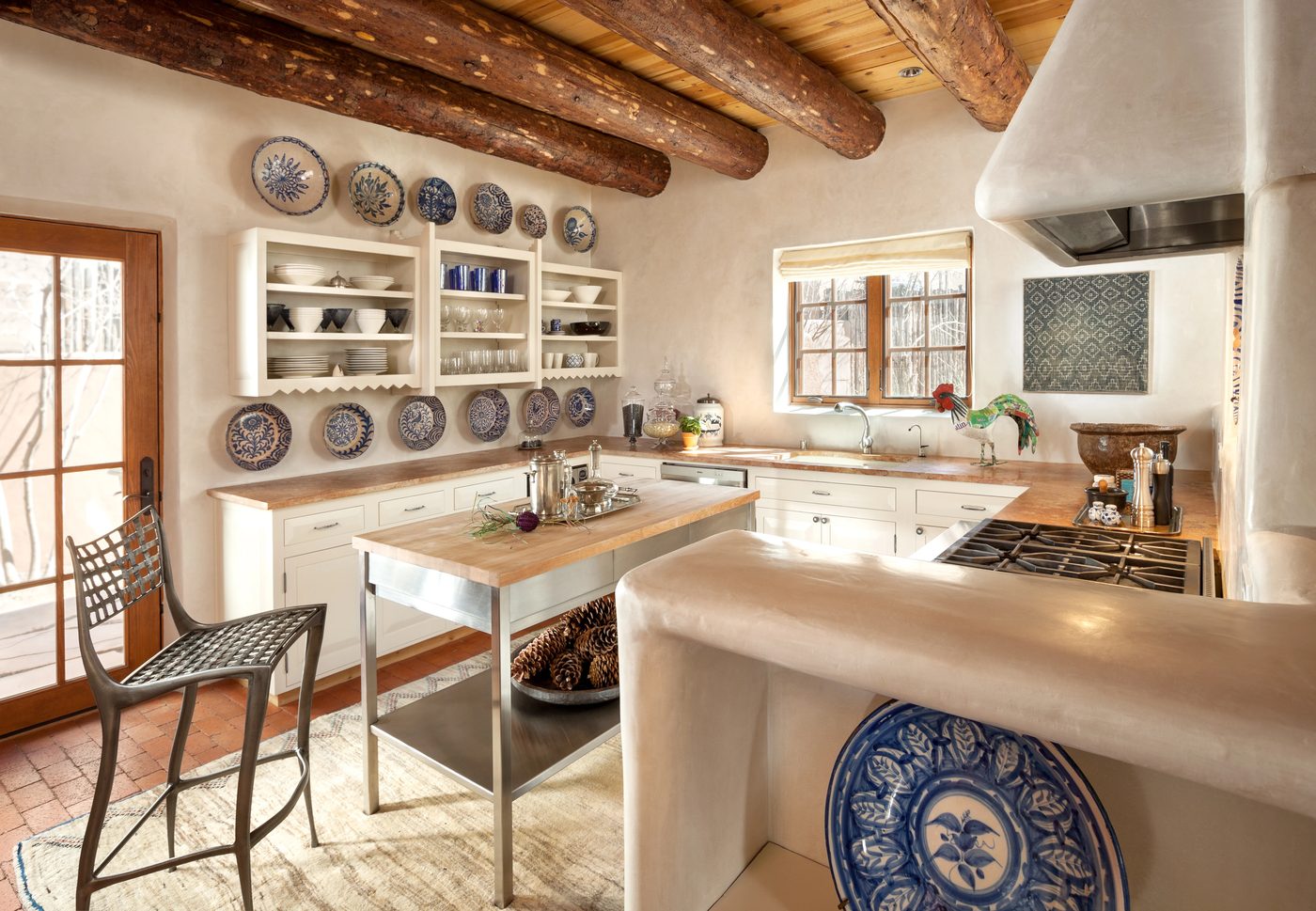 Updated kitchen with traditional southwestern wood beams | by Violante & Rochford Interiors, photo credit © Wendy McEahern