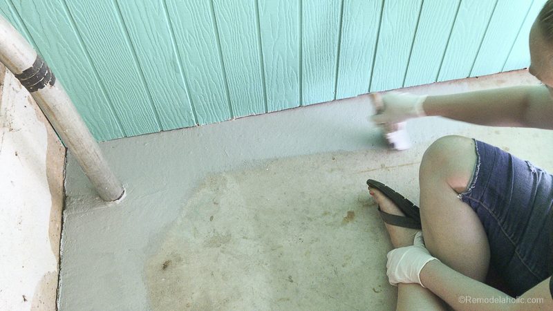 Painting A Concrete Porch or Patio With UGL Epoxy Floor Paint - brush the concrete patio paint on the edges