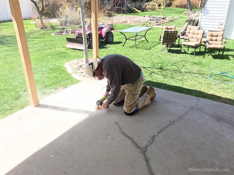 Painting A Concrete Patio With UGL Epoxy Floor Paint - grinding cracks to smooth