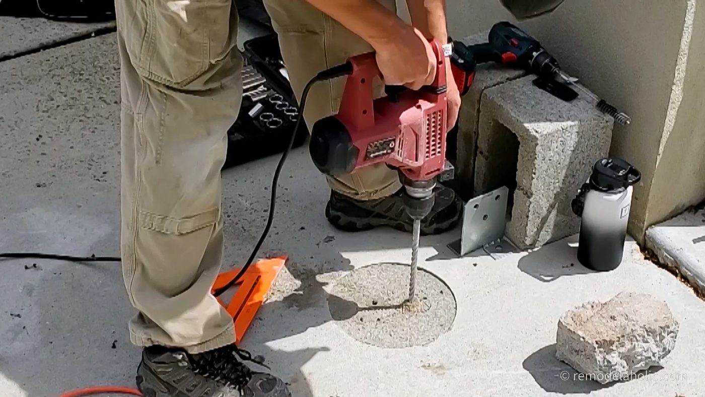 Drilling Post Base Bracket Holes In Pergola Concrete Footing