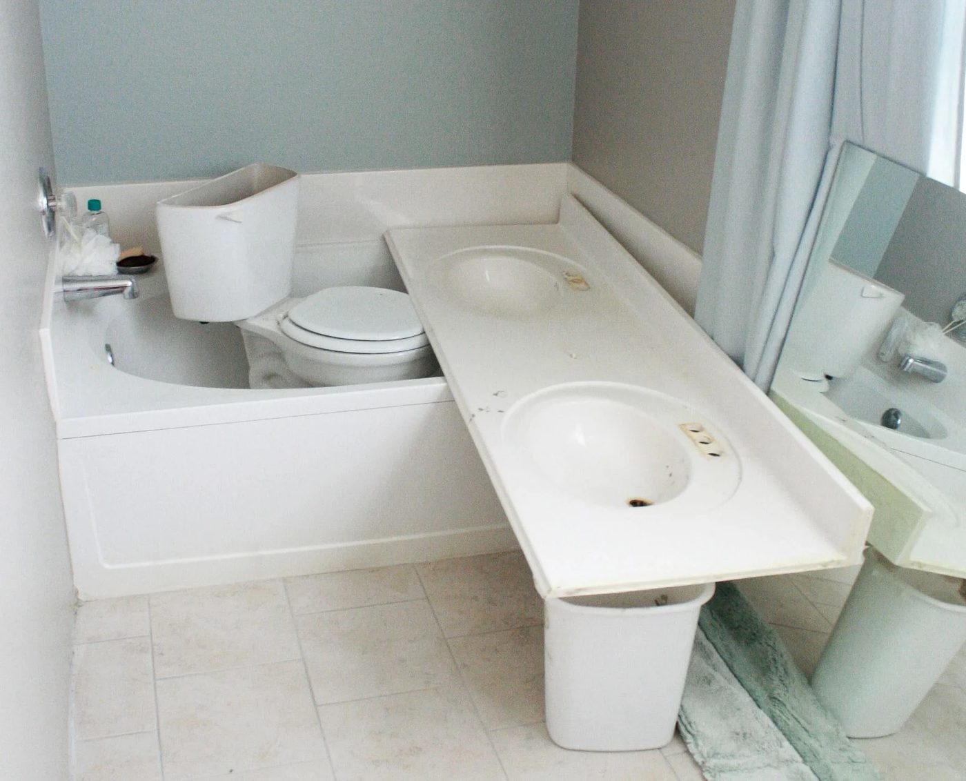 storing the mirror toilet and countertop in the tub til we finished. 1 How To Add Height To A Short Bathroom Vanity How To Raise Bathroom Vanity walkthrough (13)