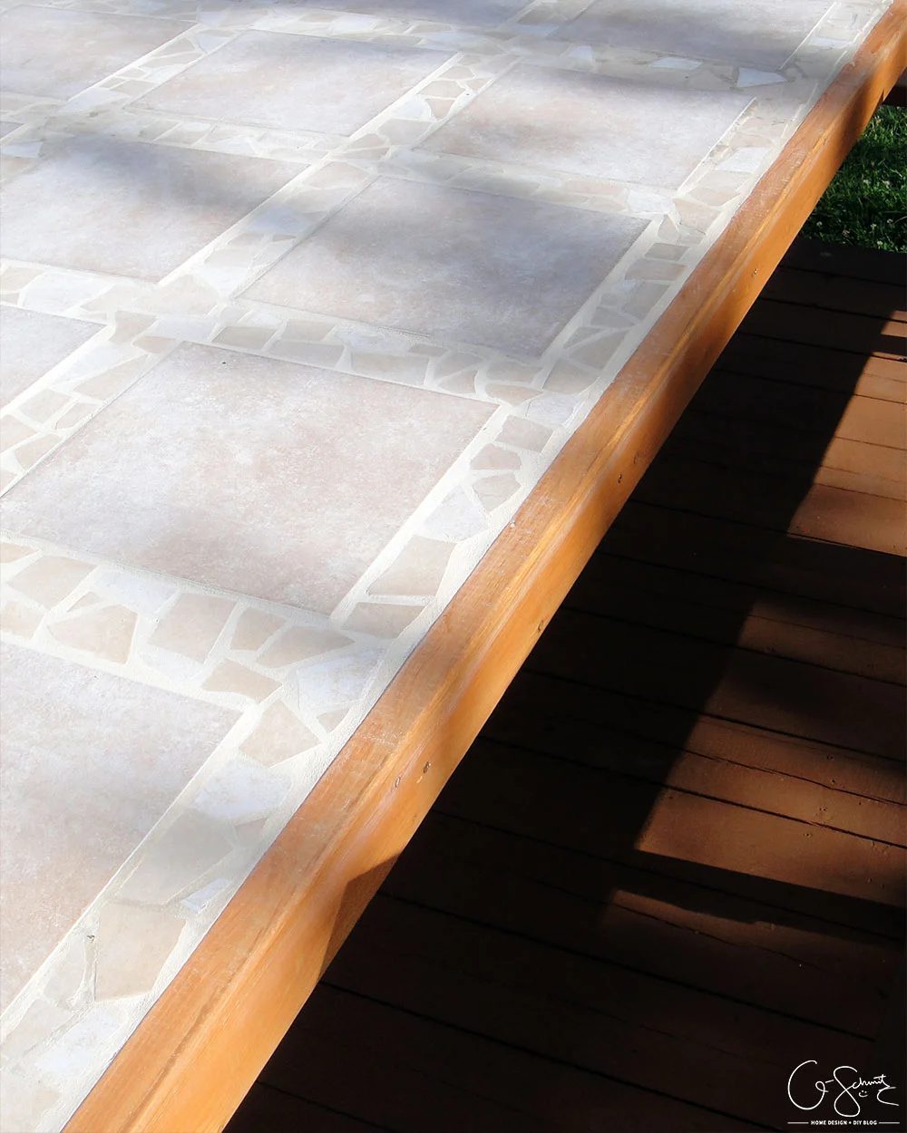 Handmade tiled table top with upcycled patio table frame by Q-Schmitz featured on @Bekob