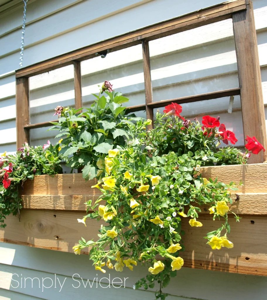 Simply Swider - old window into outdoor planter window box decoration - via Bekob