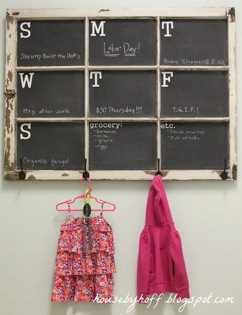 House by Hoff - old paned window into chalkboard weekly calendar and coat hooks - via Bekob