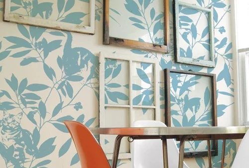 source unknown - salvaged old window gallery wall on patterned wallpaper - via Bekob