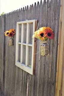 Babblings and More - old window and mason jars as outdoor fence decoration - via Bekob