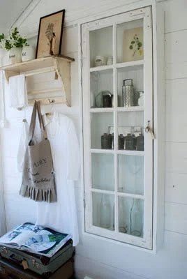source unknown - paned window into shallow wall cabinet - via Bekob