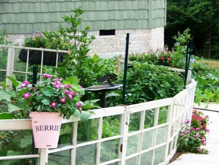 Flower Garden Girl - old window vegetable garden fence - via Bekob