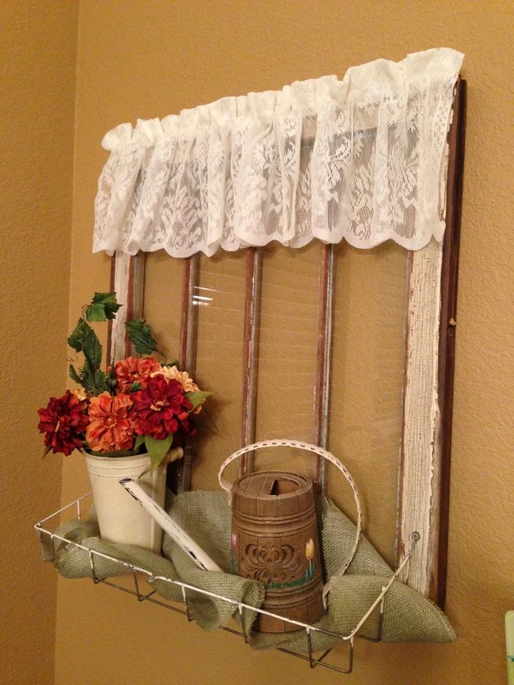 source unknown - add a wire basket to an old window to use as an organizer - via Bekob