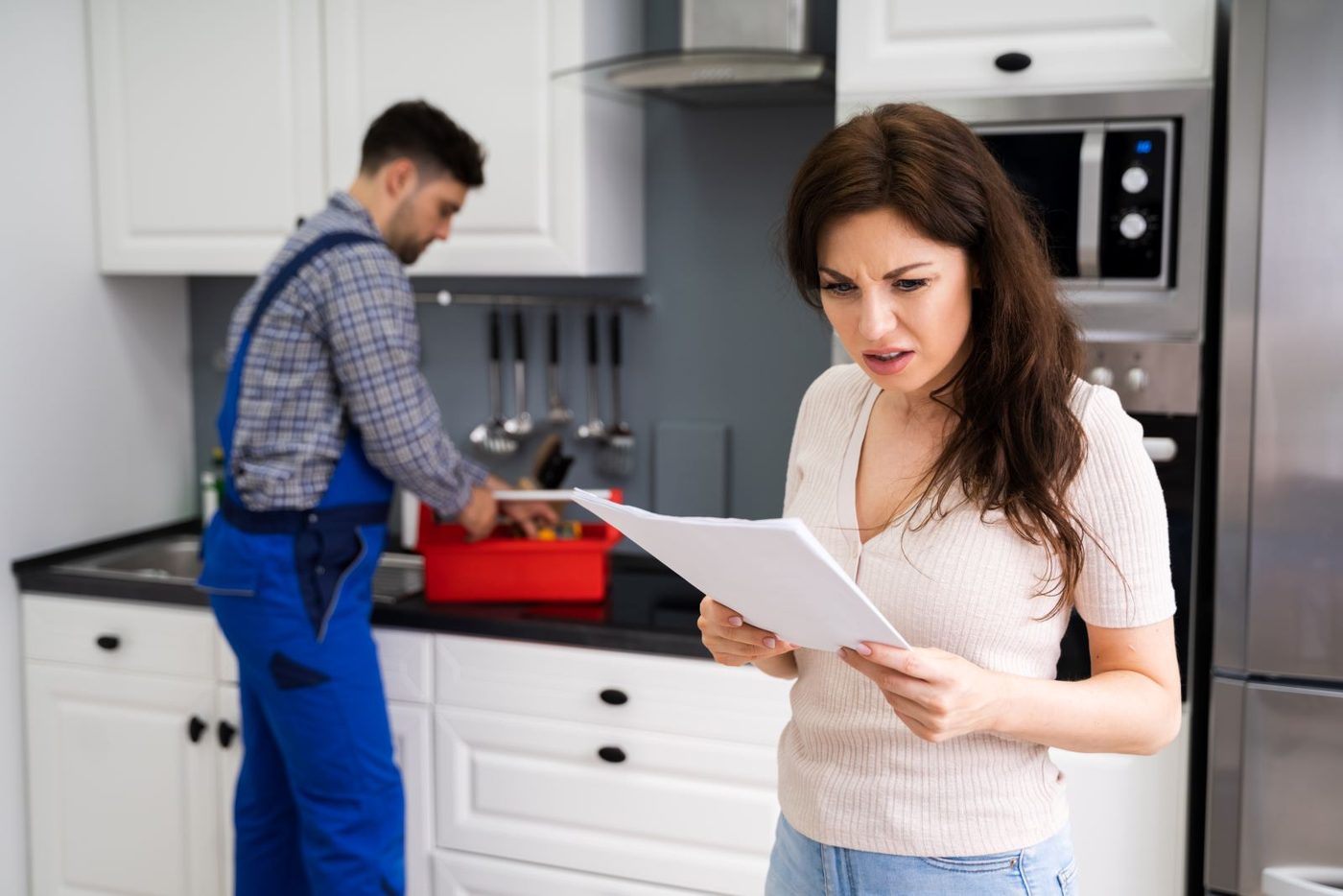 Woman And Repair Man
