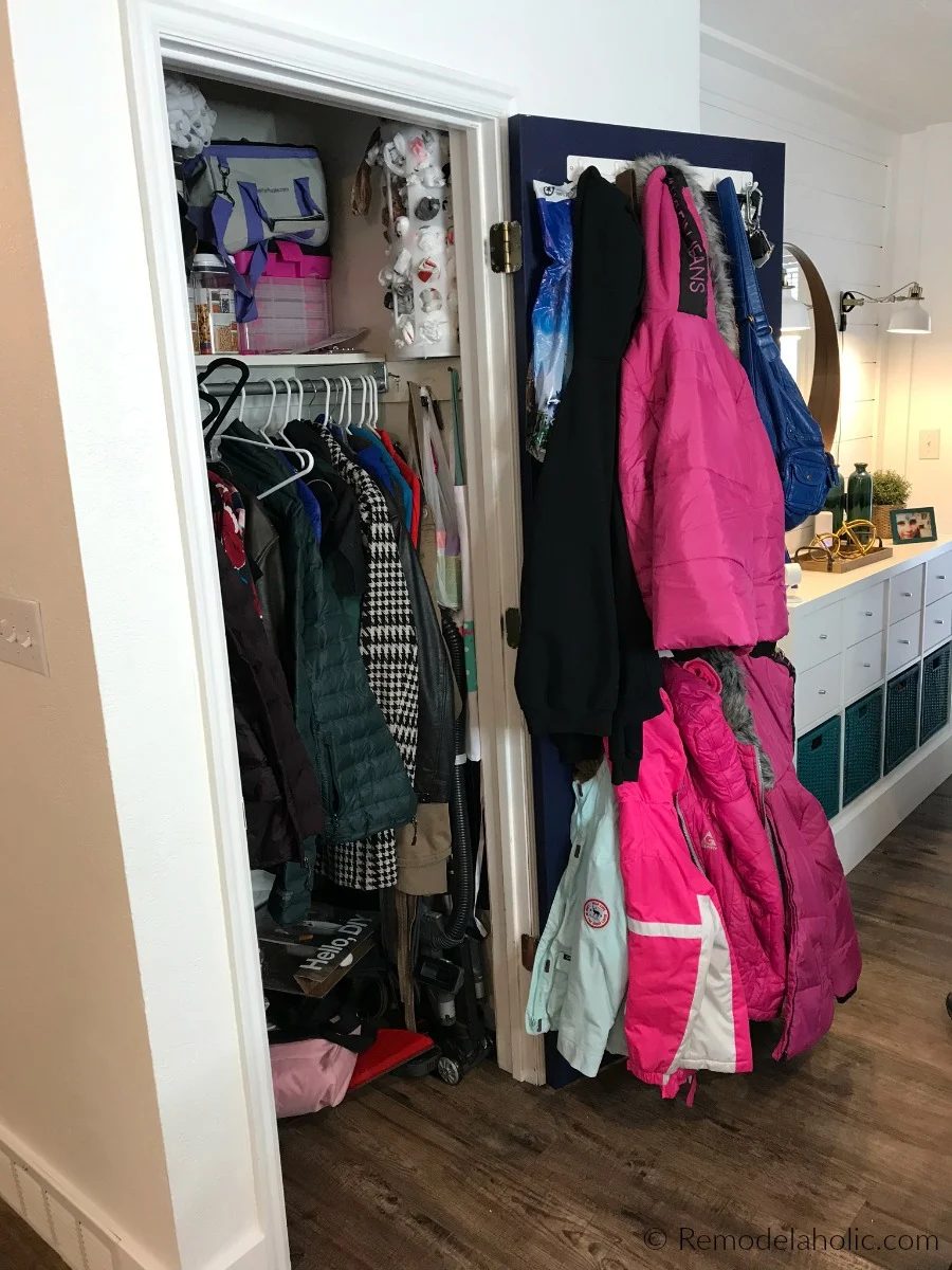 BEFORE: Small Entryway Coat Closet Organization Declutter Revamp With Double Hanging Bars And A Dual Duty Cleaning Closet Space #Bekob