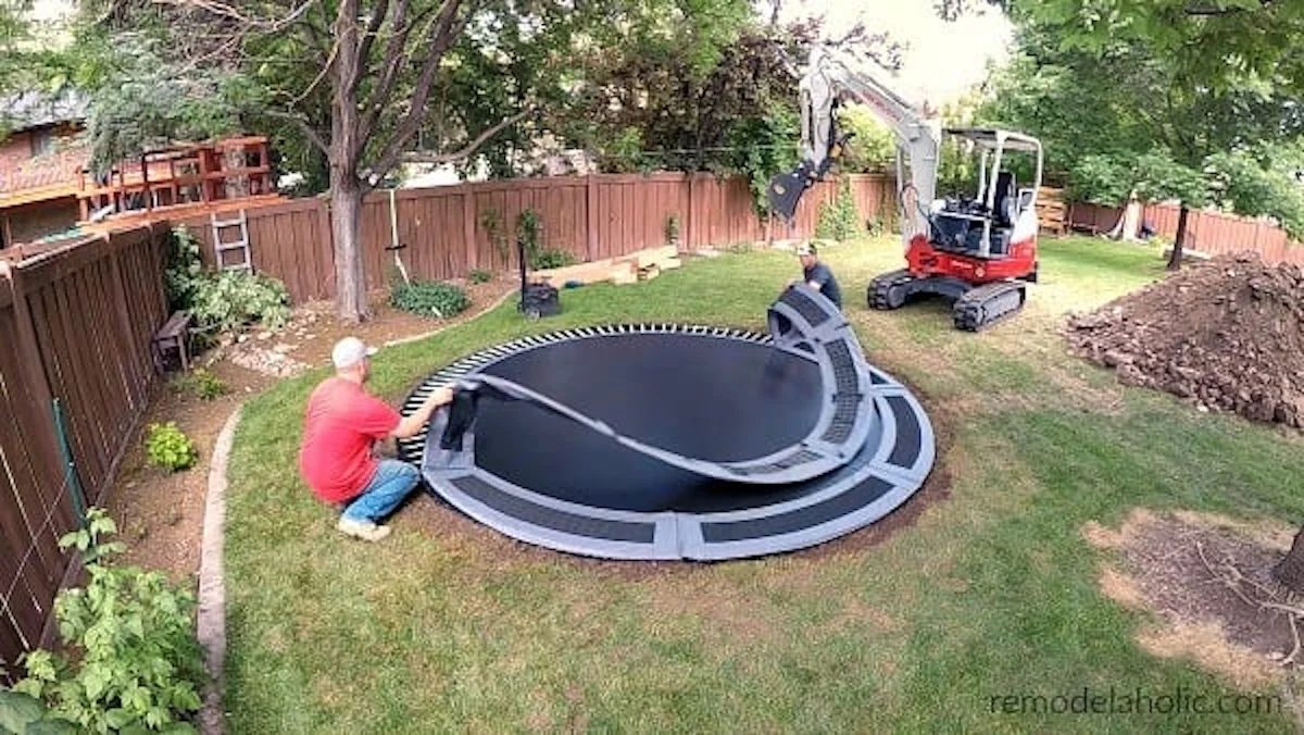 Adding The Trampoline Mat And Vented Pads To In Ground Trampoline Bekob 600x338