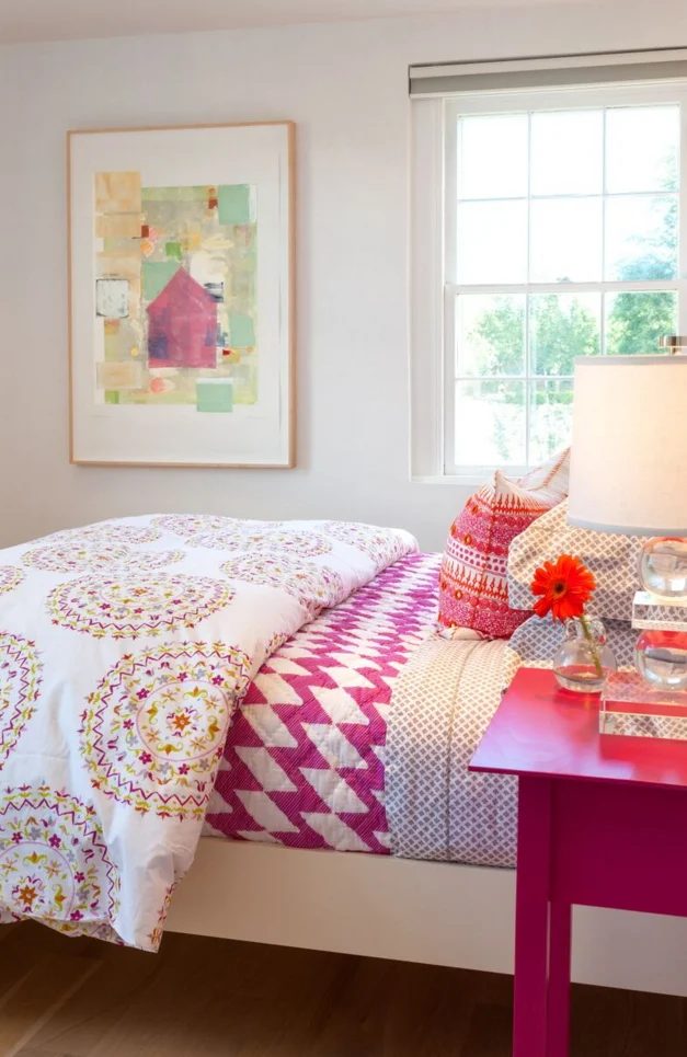 Great use of patterns on this pink bed setup! Bedroom by Violante & Rochford Interiors, photo credit © Wendy McEahern