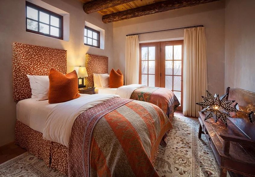 colorful orange modern Southwest shared bedroom by Violante & Rochford Interiors, photo credit © Wendy McEahern