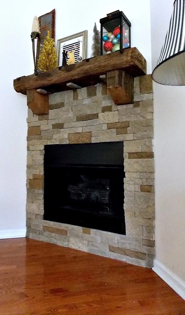 airstone fireplace with rustic mantel - Sweet Parrish Place via @Bekob