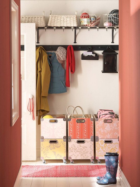Red mudroom with rolling storage crates and shaker peg coat hooks. Love the patterned boxes! | 100+ striking Mudrooms and Entryways at Bekob.com